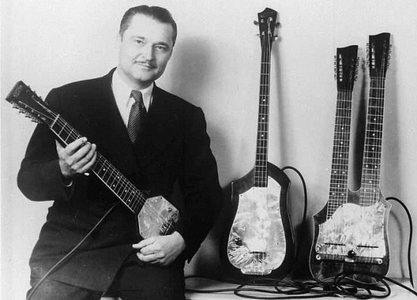 Paul Tutmarc z pierwszym prototypem gitary elektrycznej